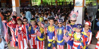 Mother gets to sew National Day costume