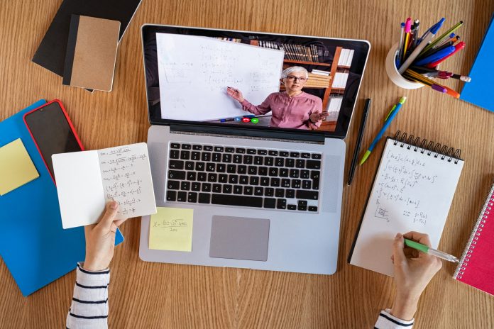 student-learning-at-home-with-online-lesson-PA4YJZH-scaled