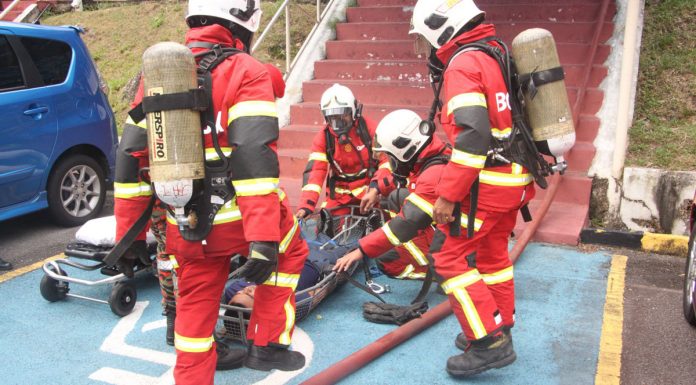 Ditching her stilettos for firemen’s boots