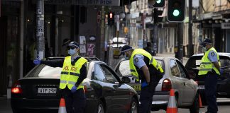 Soldiers patrol streets in Sydney to stem virus spread
