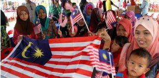 Pensioner decorates house with hundreds of Jalur Gemilang