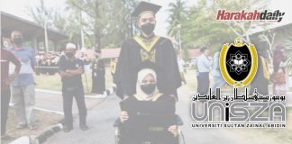 Graduan dalam pantang berkerusi roda terima ijazah