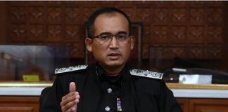 Immigration Dept uncovers syndicate issuing refugee cards to ethnic Chin