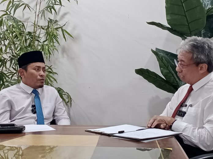 Prof Teo