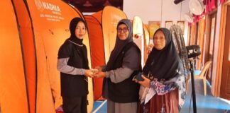 Muslimat PAS agih sumbangan kepada mangsa banjir