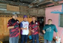 Ismi sertai misi bersih banjir di Kampung Bakong
