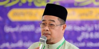 Islam Umno sekadar slogan politik – Rozi Muhamad