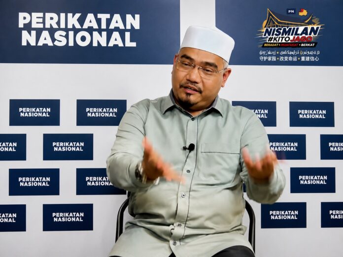 USTAZ ASRI